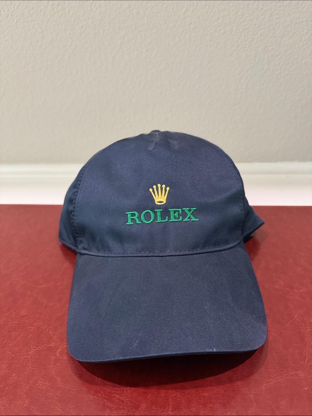 Rolex Navy Hat With Green Embroidered Logo And Yellow Crown